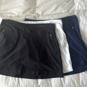 3 Nike Golf Skorts: black, white, navy